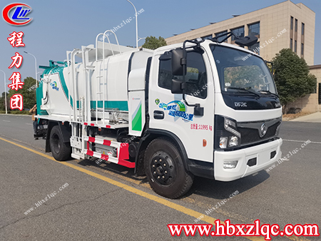 處理食物殘?jiān)易钤谛?，新能源油電混合餐廚垃圾車實(shí)現(xiàn)健康生活每一天